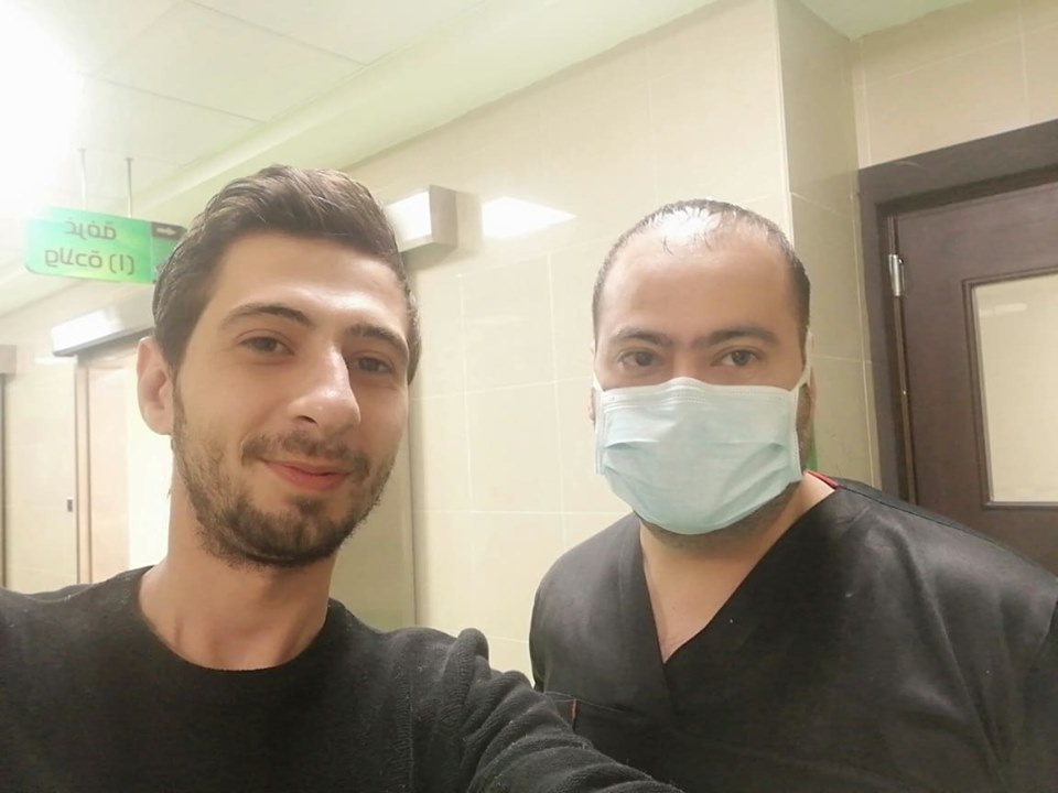 الفريق الطبى بعد توليد المصابة بكورونا بالمستشفى
