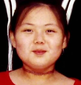 كيم يو أثناء طفولتها
