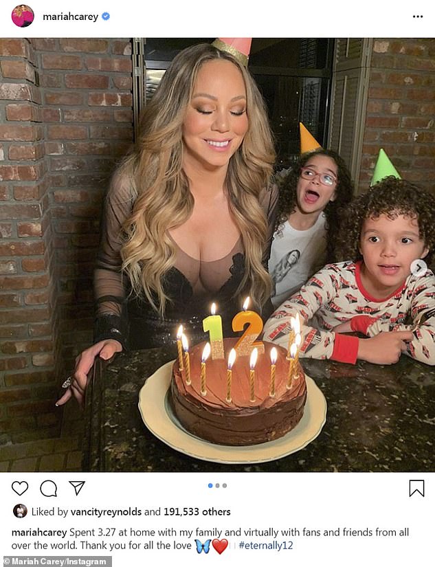 26568704-8186249-_Eternally12_Mariah_Carey_shared_a_snap_of_herself_blowing_out_h-a-7_1585950722626