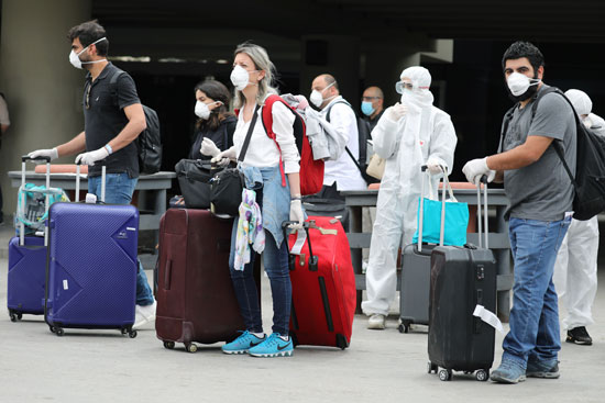 اللبنانيون-،-الذين-تقطعت-بهم-السبل-في-الخارج-بسبب-عمليات-إغلاق-فيروسات-التاجية-،-يصلون-إلى-مطار-بيروت-الدولي
