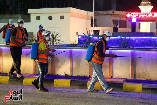 محافظة الجيزة تنفذ أكبر حملة لتطهير الشوارع ضد فيروس كورونا  (13)