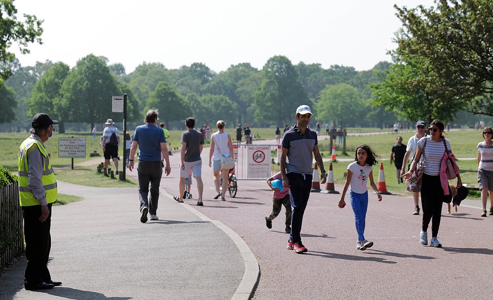28193494-8304549-Families_enjoying_the_sunshine_in_Richmond_Park_London_today_as_-a-57_1589105645812