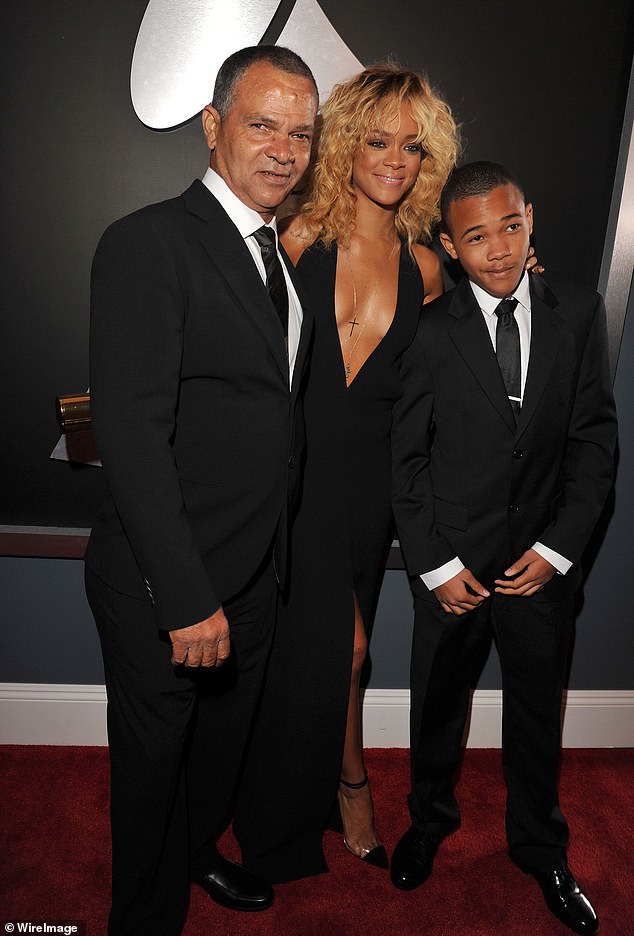 8562924-6595315-Family_Rihanna_with_her_father_and_little_brother_Rajad_in_2012_-a-66_1547715866733