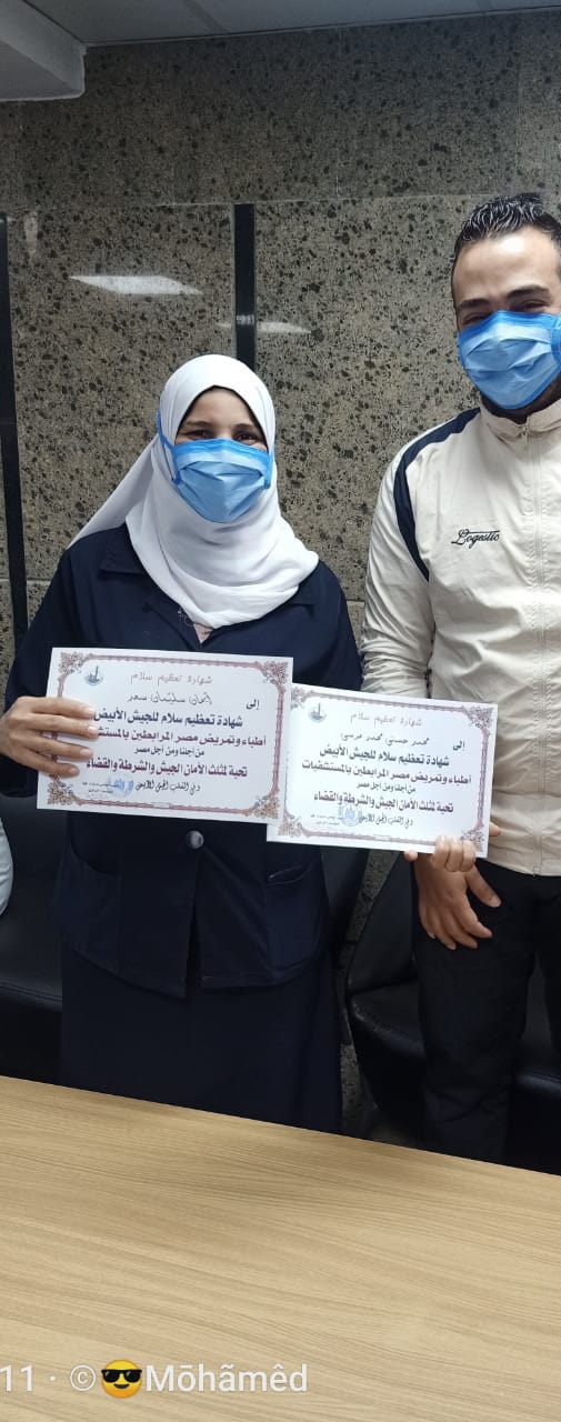محمد حسنى وإيمان سليمان مسؤولة الترصد بالمستشفى