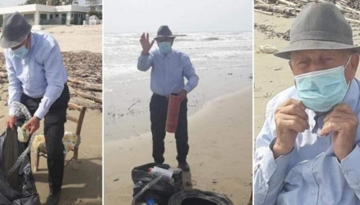 173-003906-grandfather-italy-lockdown-clean-beach_700x400