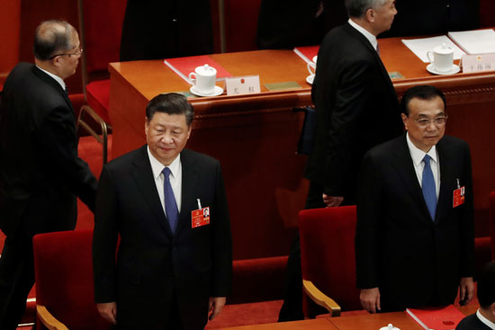 يحضر الرئيس الصيني شي جين بينج ورئيس مجلس الدولة لي كه تشيانج الجلسة الختامية للمجلس الوطني لنواب الشعب الصيني