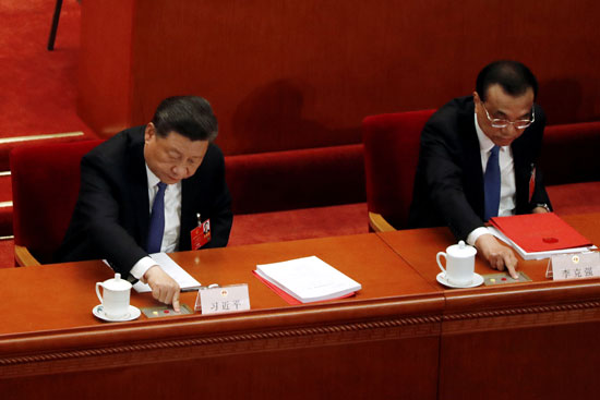 أدلى الرئيس الصيني شي جين بينج ورئيس مجلس الدولة لي كه تشيانج بأصواتهما على تشريع الأمن القومي لمنطقة هونج كونج