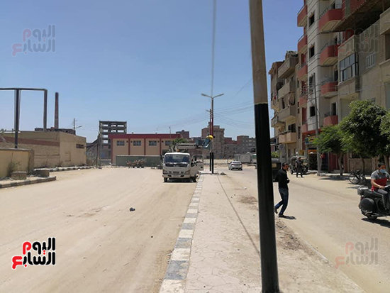 تطوير طريق نادى الشرطة بالمحلة ورفع تراكمات القمامة (1)