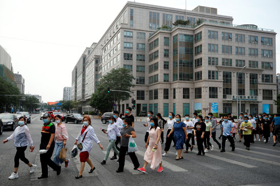 الصينيون يتوجهون لمراكز فحص الحمض النووى
