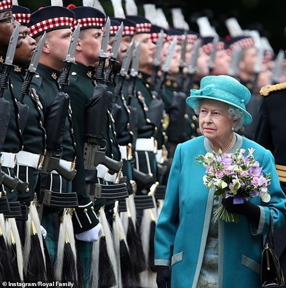 30186334-8474667-As_part_of_the_ceremony_the_Queen_inspects_a_guard_of_honour_pro-a-12_1593519639073