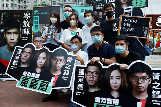 الصور في حملة خلال الانتخابات الأولية تهدف إلى اختيار مرشحي الديمقراطية ، في هونغ كونغ