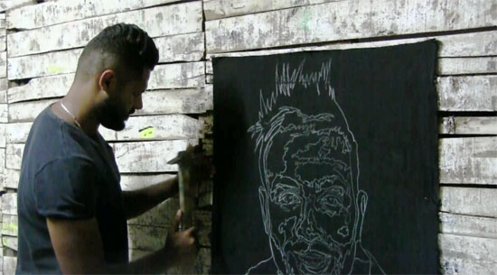 محمد يرسم الفنانين بالطباشير (1)