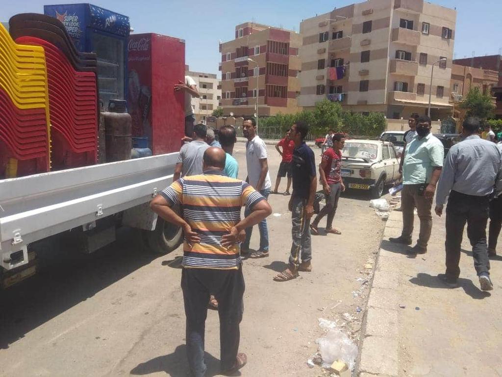 حملة مكبرة لضبط مخالفات تغيير النشاط ورفع الإشغالات بالحى الثالث (1)