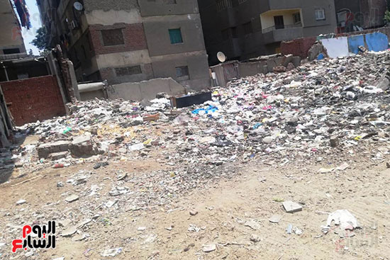 مساكن السودان بالدقى تغرق فى القمامة والصرف الصحى (11)