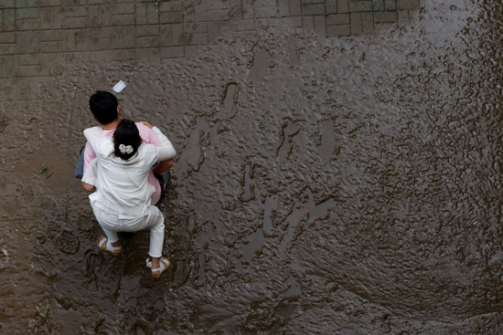 2020-08-04T063842Z_855433318_RC2U6I9WKW40_RTRMADP_3_SOUTHKOREA-FLOODS