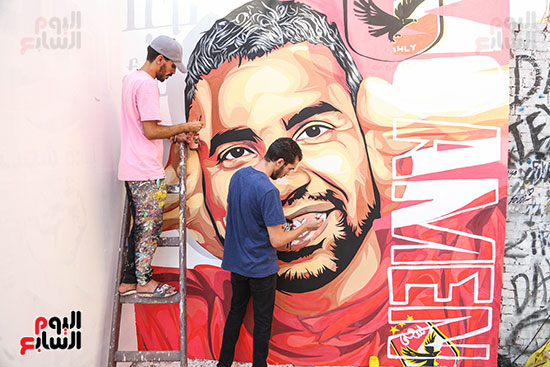 سيد ومحمد سعودى يرسمان جرافيتي دعم مؤمن