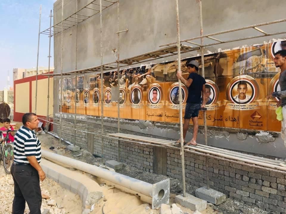 جداريات بطولات شهداء الجيش تزين ميادين العريش  (1)