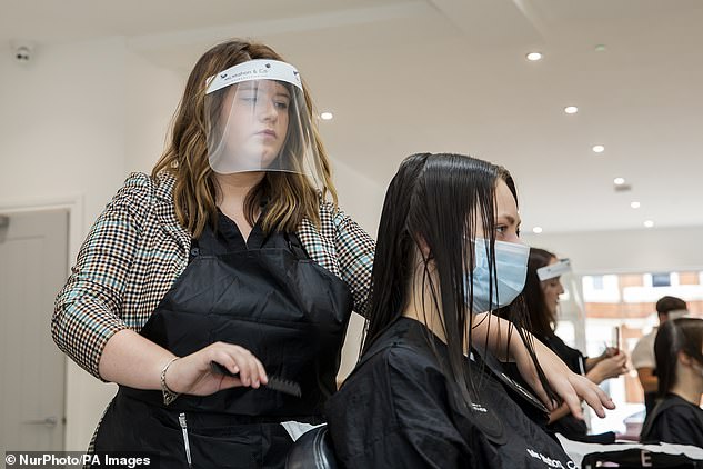 31682954-8763293-Hairdressers_and_barbers_should_wear_face_coverings_and_not_just-a-13_1600850603648