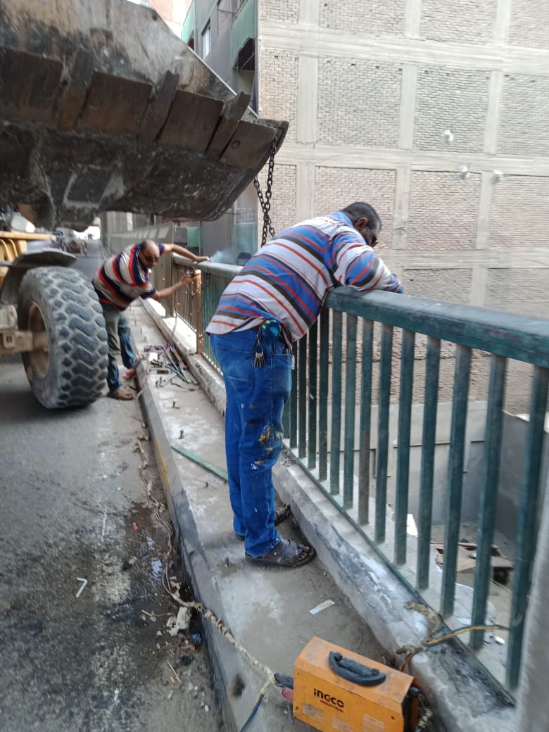 اعمال صيانة كوبرى الساحل ومحور صفط (9)