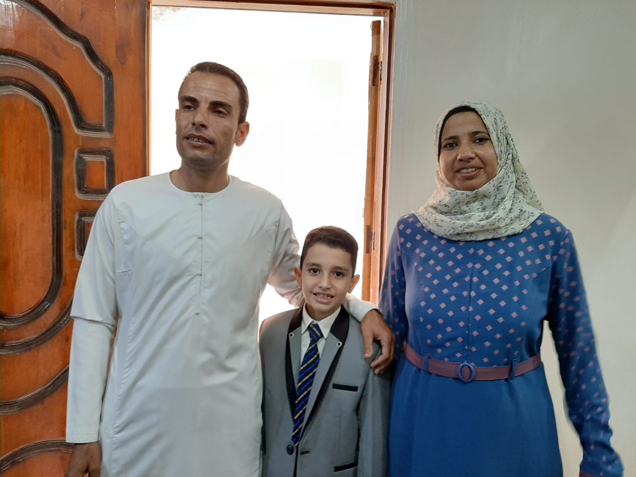 أسرة الطفل المعجزة أحمد تحتفل مع اليوم السابع