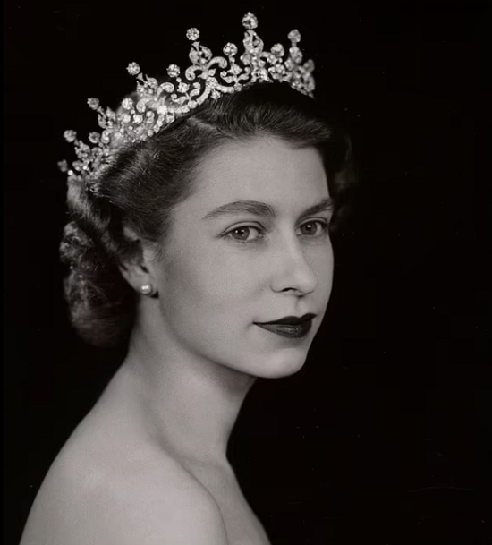 The queen wearing her crown