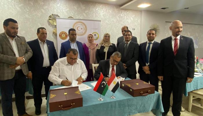 توقيع البروتوكول مع ليبيا
