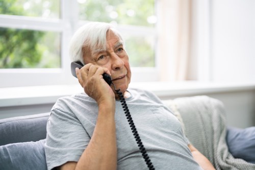 older-man-landline-phone