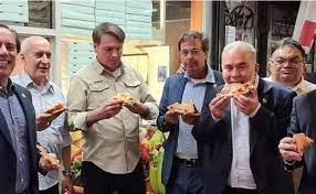 رئيس البرازيل يأكل بيتزا فى شوارع نيويورك