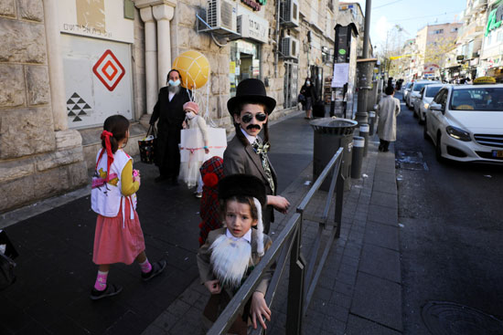 2021-02-26T131945Z_1289478224_RC2D0M93PQR0_RTRMADP_3_RELIGION-PURIM-ISRAEL