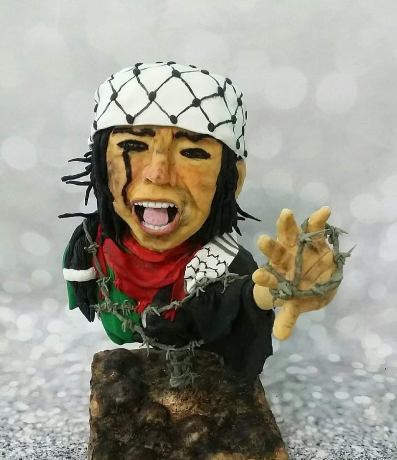 مجسم من الكيك لدعم فلسطين