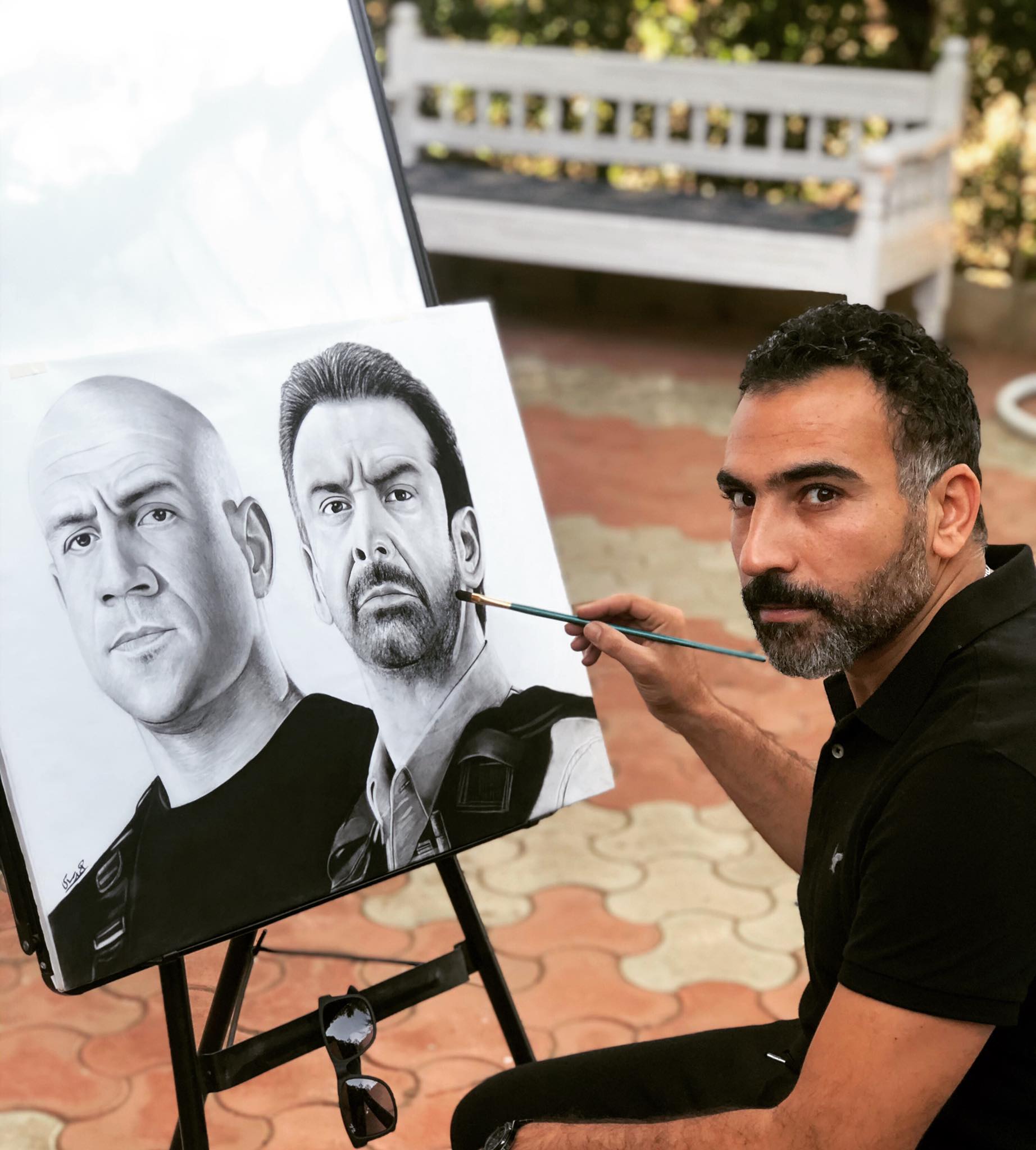 احمد سامي مع اللوحة