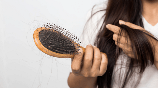 علاج سقوط الشعر بعد الولادة
