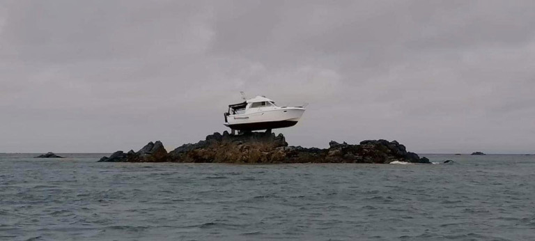 boat on rocks