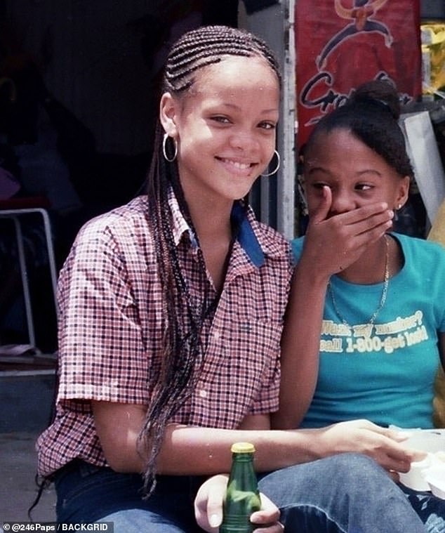 1632693373_351_Rihanna-pictured-as-a-14-year-old-girl-modeling-costumes-in-her