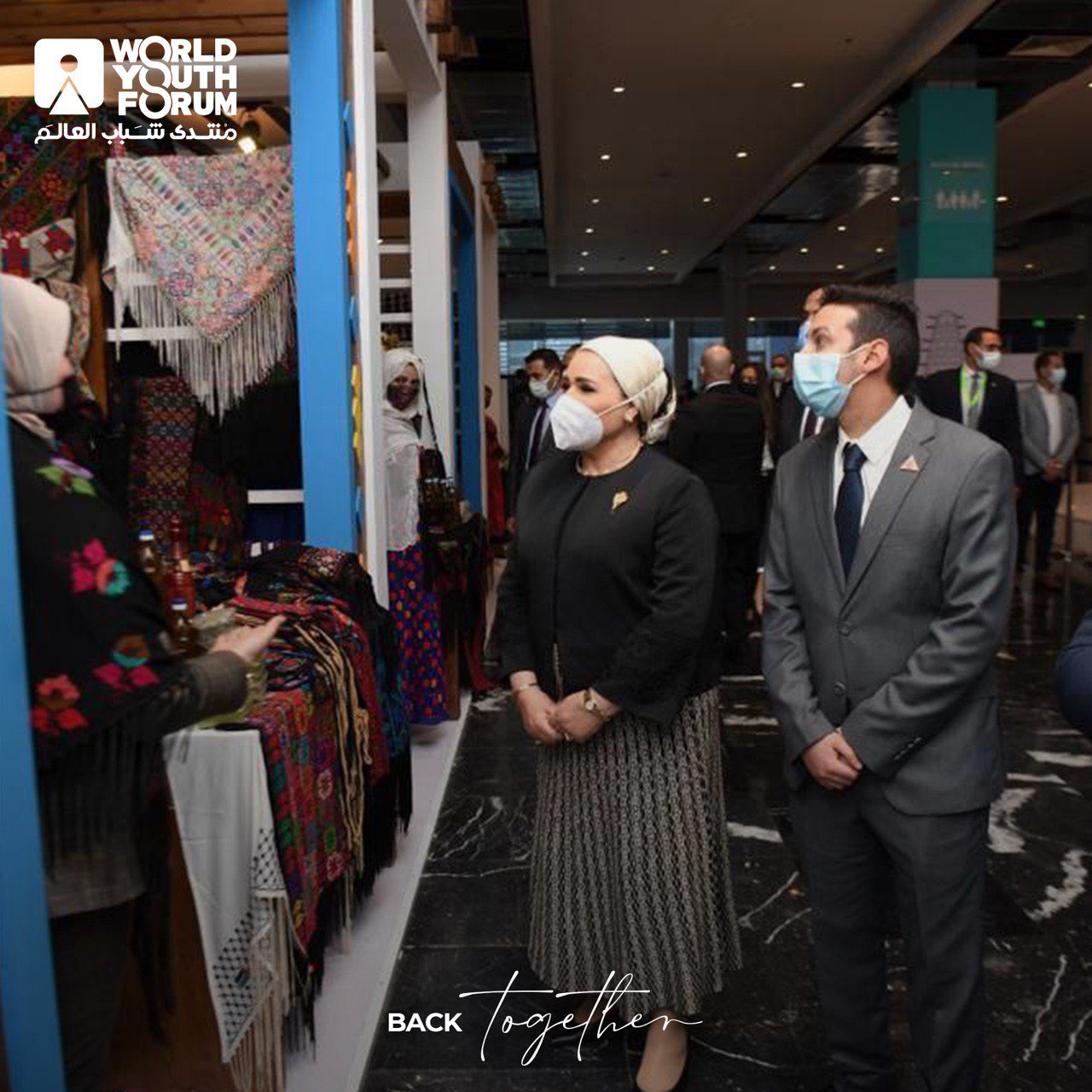 Mrs. Intisar El-Sisi takes a look at some of the exhibits