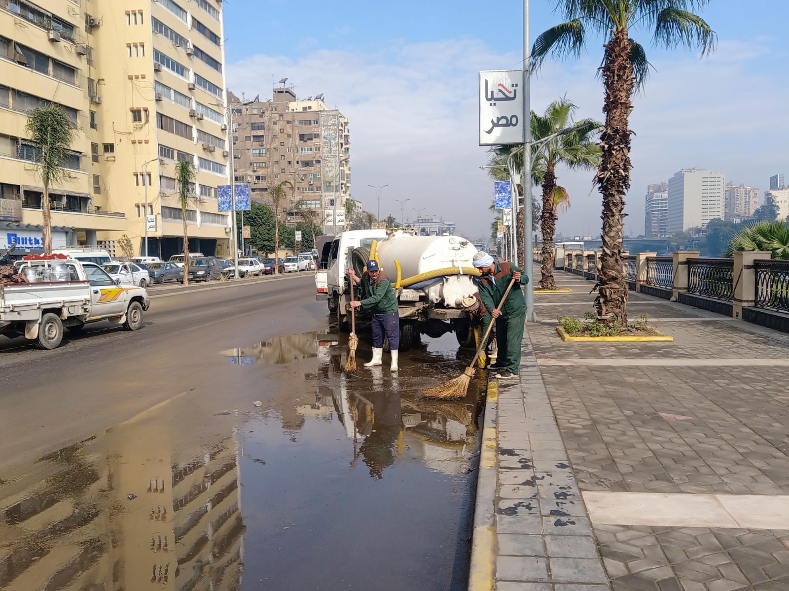 كسر ماسورة مياه بشارع النيل بالجيزة (10)