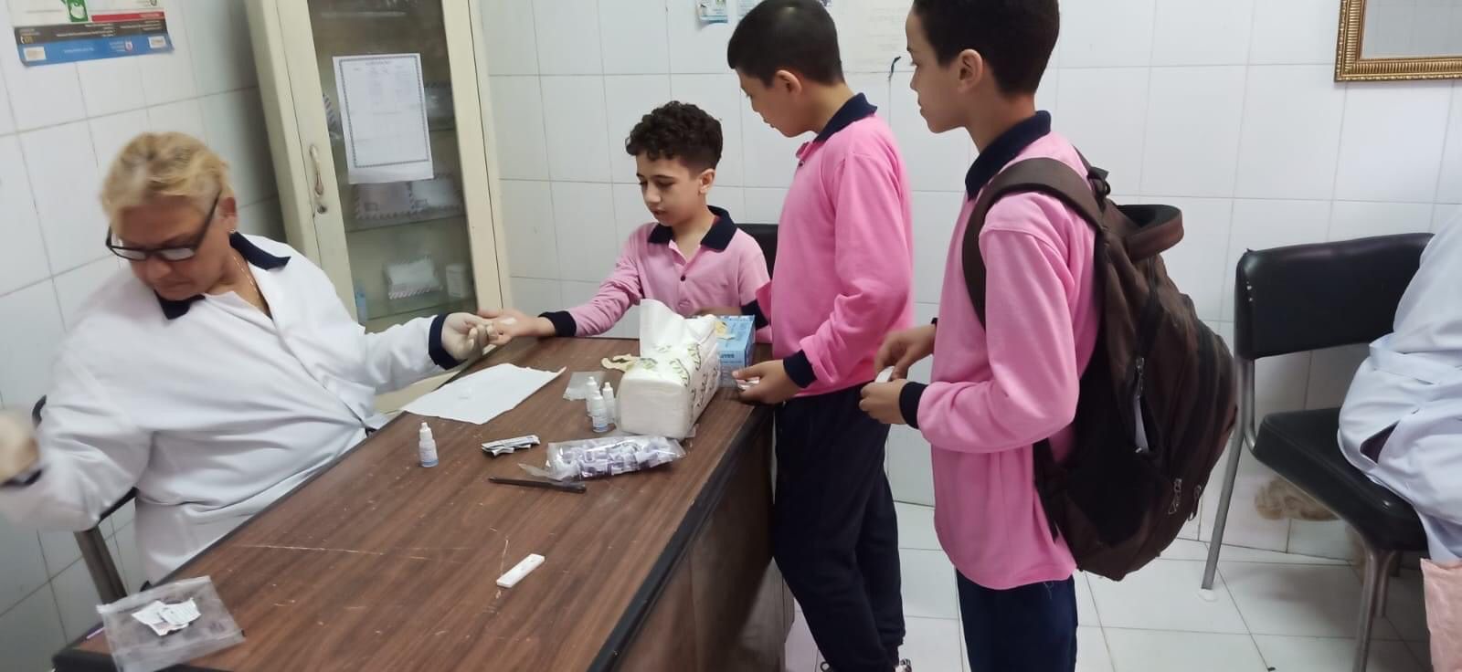 تطعيم الطلاب بالجيزة