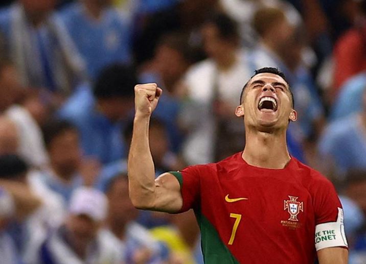 البرتغالي كريستيانو رونالدو يحتفل بتسجيل هدفه الأول ضد أوروجواي
