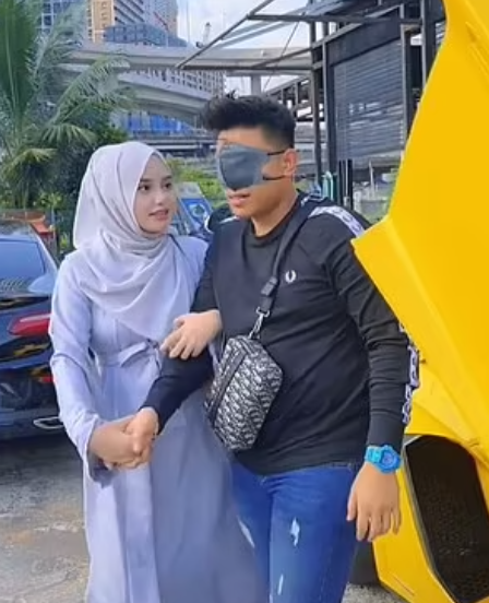 سيدة الماليزية وزوجها 