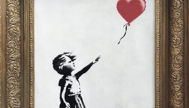 173-215443-girl-balloon-painting-banksy_700x400