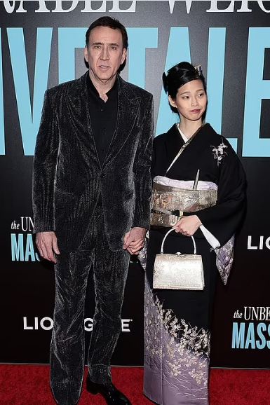 نيكولاس كيج برفقة زوجته في عرض فيلمه
