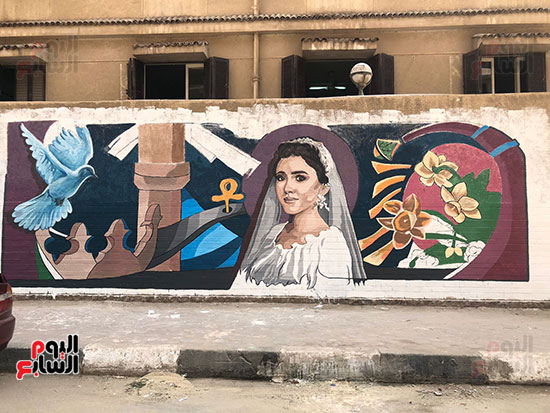 جرافيتى-نيرة-أشرف-على-سور-الجامعة