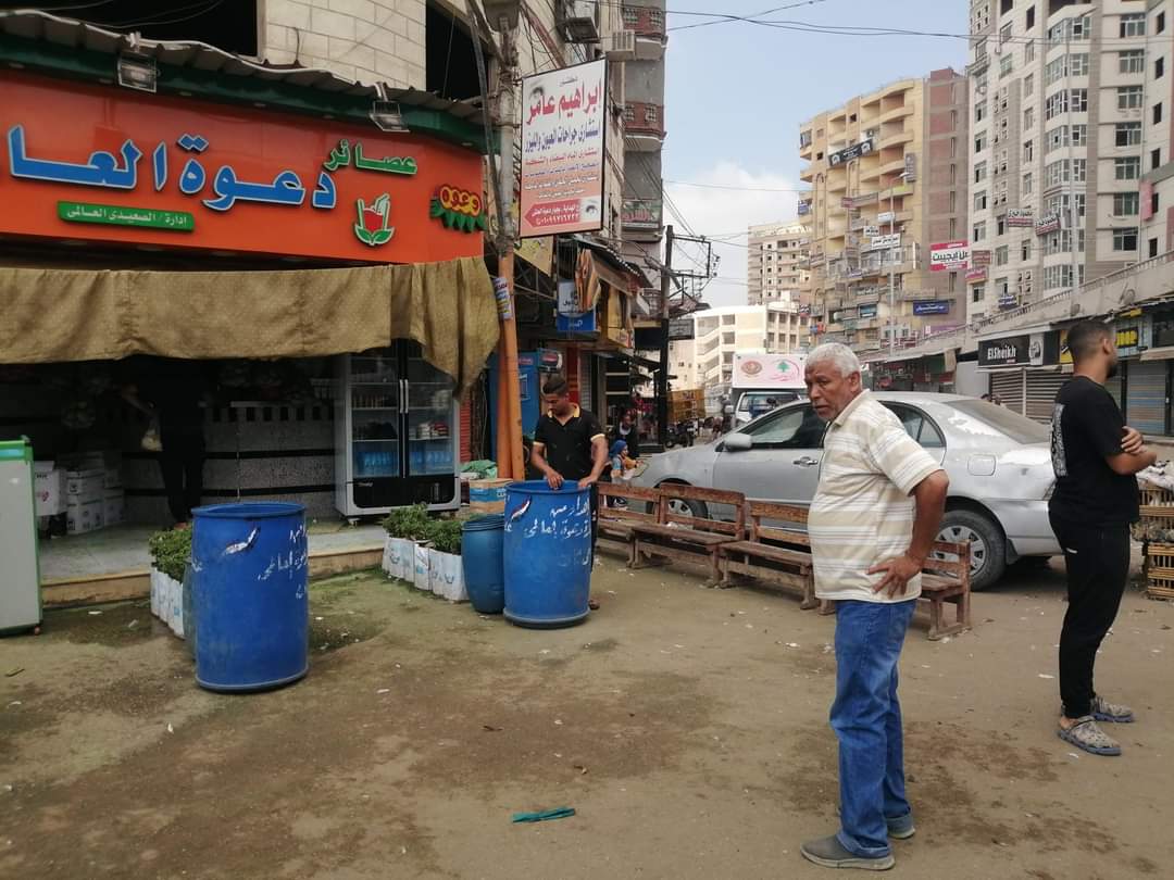 فض سوق عشوائى ورفع مخلفات القمامة ومصادرة معدات بناء بحي ثان المحلة  (7)