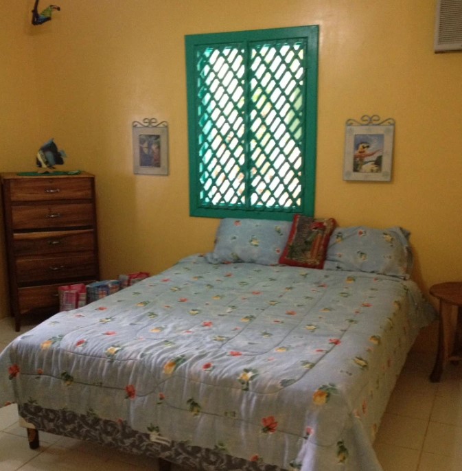 غرفة النوم بمنزل جزيرة ايجوانا