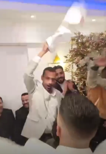 Imam Ashour celebrates his “engagement” at a family party.  Pictures