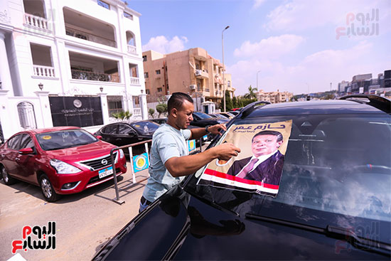 مسيرة بالسيارات تحمل صور النائب حازم عمر (3)