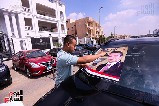 مسيرة بالسيارات تحمل صور النائب حازم عمر (5)