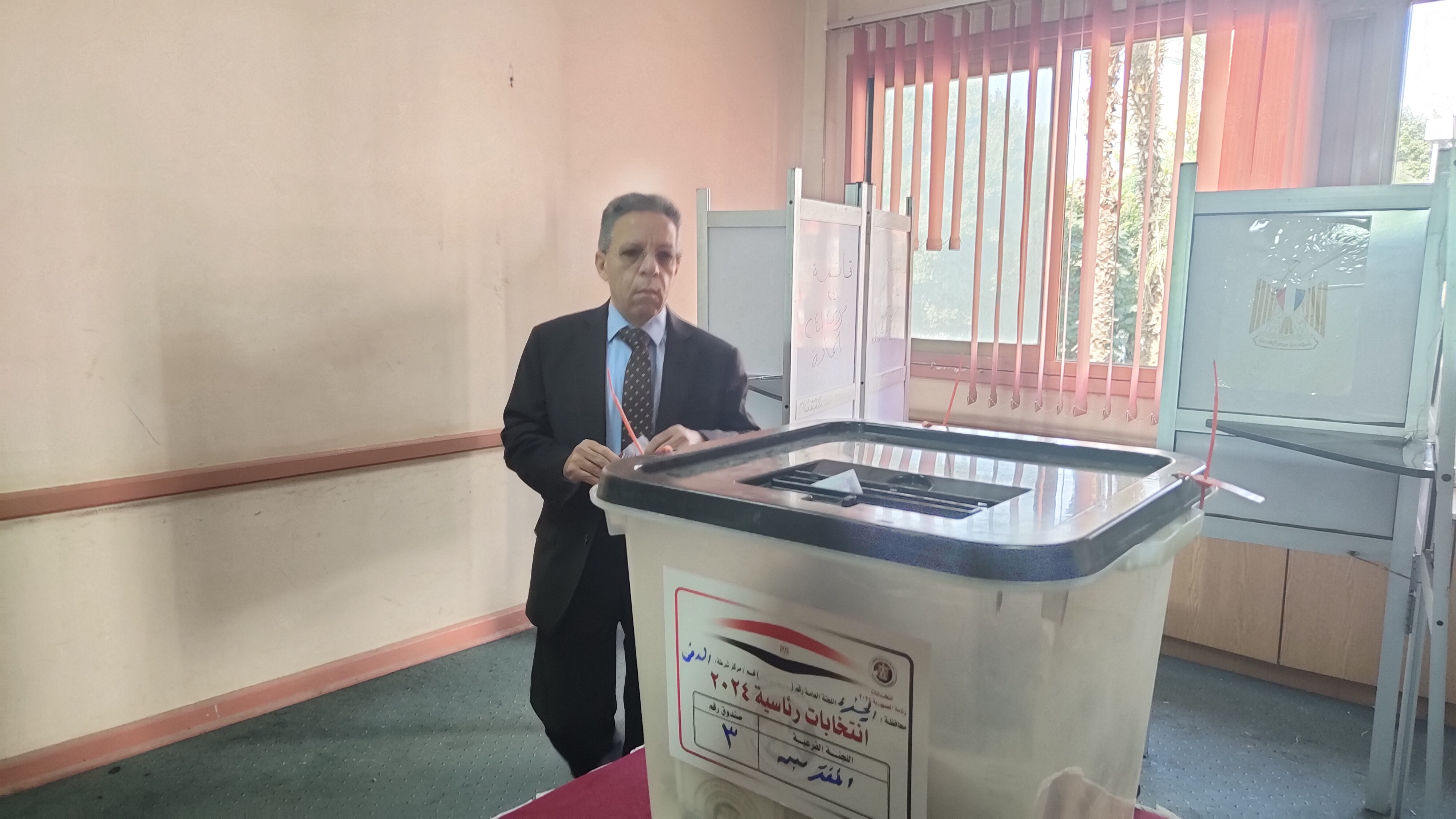 الدكتور أسامة عبد الحى خلال مشاركته بالانتخابات