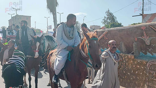 مسيرة-بالخيول-أمام-لجان-الانتخابات-الرئاسية-في-مركز-أبو-تيج-بأسيوط-(6)