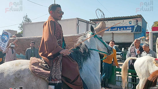 مسيرة-بالخيول-أمام-لجان-الانتخابات-الرئاسية-في-مركز-أبو-تيج-بأسيوط-(5)